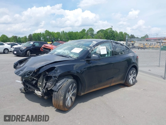 2023 Tesla Model Y Long Range with VIN 7SAYGDEE6PA166514, listed as a IAAI auction lot 41359540 with 16,271 mi miles. Bid and sale history available at carsss.com. Image 17.