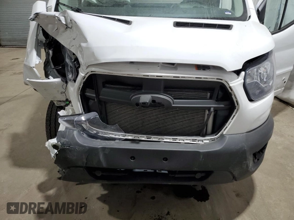 2023 Ford Transit Cargo with VIN 1FTBR1Y81PKB56612, listed as a Copart auction lot 46652685 with Not Provided miles and Salvage Title. Bid and sale history available at DreamBid. Image 12.