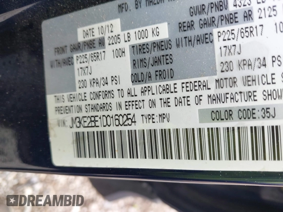 2013 Mazda CX-5 Sport with VIN JM3KE2BE1D0160254, listed as a IAAI auction lot 42256555 with 136,476 mi miles and . Bid and sale history available at DreamBid. Image 9.