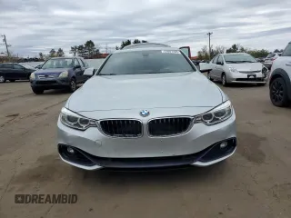 2016 BMW 4 Series 428i xDrive with VIN WBA3N9C56GK249666, listed as a Copart auction lot 53881285 with 140,031 mi miles and Salvage title. Bid and sale history available at DreamBid. Image 5.