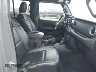 2023 Jeep Wrangler Sahara with VIN 1C4JJXP6XPW698886, listed as a IAAI auction lot 42439690 with 41,787 mi miles and . Bid and sale history available at DreamBid. Image 5.