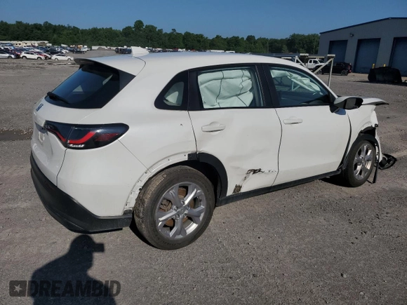 2023 Honda HR-V LX with VIN 3CZRZ2H38PM707744, listed as a Copart auction lot 60625805 with 82,874 mi miles and Salvage title. Bid and sale history available at DreamBid. Image 3.