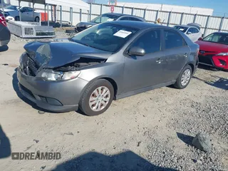 2012 Kia Forte EX with VIN KNAFU4A24C5560114, listed as a IAAI auction lot 41669309 with 236,464 mi miles. Bid and sale history available at carsss.com. Image 2.