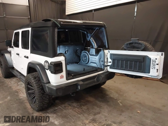 2019 Jeep Wrangler Unlimited Sport S z VIN 1C4HJXDG4KW639403, wystawiony jako IAAI lot #42158096 z przebiegiem 132 569 mil mil oraz . Historia ofert i sprzedaży dostępna na DreamBid. Obrazek 3.