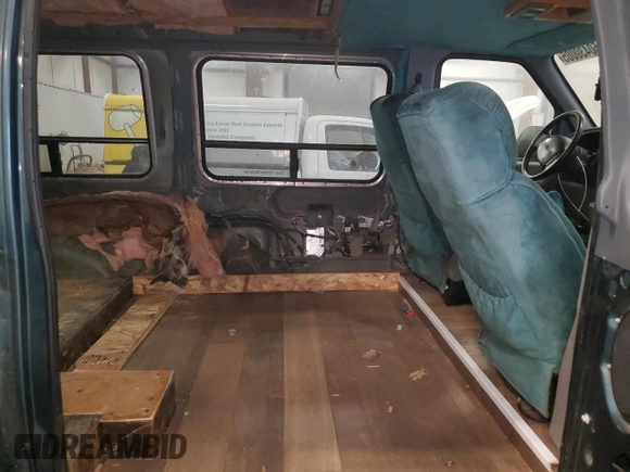 1997 Ford Econoline Commercial z VIN 1FDEE14L1VHB87027, wystawiony jako Copart lot #50430005 z przebiegiem 94 221 mil mil oraz Tytuł czysty. Historia ofert i sprzedaży dostępna na DreamBid. Obrazek 11.