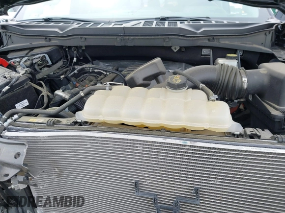 2022 Ford F-150 XL with VIN 1FTFW1E5XNKD93407, listed as a IAAI auction lot 42381355 with 26,816 mi miles and . Bid and sale history available at DreamBid. Image 10.