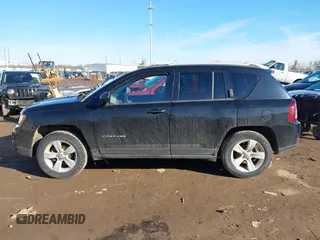 2016 Jeep Compass Sport with VIN 1C4NJDBB0GD571824, listed as a IAAI auction lot 41650610 with 147,261 mi miles. Bid and sale history available at carsss.com. Image 14.