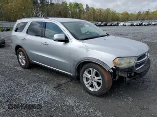 2011 Dodge Durango Crew with VIN 1D4RD4GG5BC730013, listed as a Copart auction lot 50032075 with 273,407 mi miles and Salvage Title. Bid and sale history available at carsss.com. Image 4.