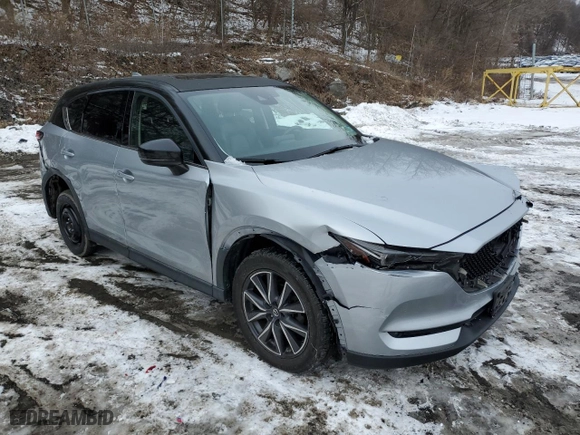 2017 Mazda CX-5 Grand Touring with VIN JM3KFBDL2H0189468, listed as a Copart auction lot 44898875 with 66,643 mi miles and Salvage Title. Bid and sale history available at carsss.com. Image 4.