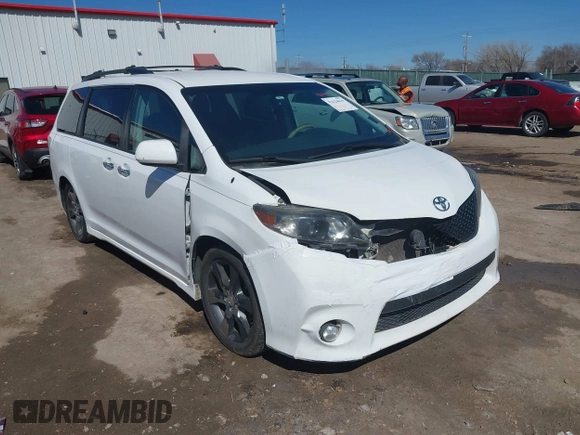 2014 Toyota Sienna SE with VIN 5TDXK3DC0ES477207, listed as a IAAI auction lot 41624619 with 213,881 mi miles and . Bid and sale history available at DreamBid. Image 1.