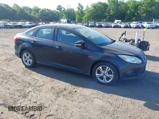 2013 Ford Focus SE with VIN 1FADP3F21DL230177, listed as a IAAI auction lot 42579815 with 243,525 mi miles and . Bid and sale history available at DreamBid. Image 1.