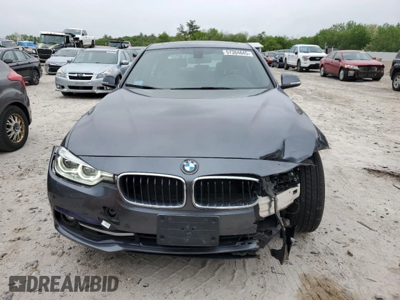 2017 BMW 3 Series 330i xDrive with VIN WBA8D9G39HNU63178, listed as a Copart auction lot 57384845 with 67,377 mi miles and Salvage title. Bid and sale history available at DreamBid. Image 5.