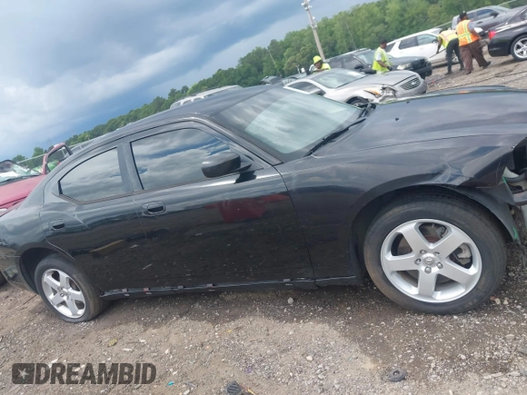 2010 Dodge Charger with VIN 2B3CK4CV0AH238001, listed as a IAAI auction lot 42449286 with 245,934 mi miles and . Bid and sale history available at DreamBid. Image 14.