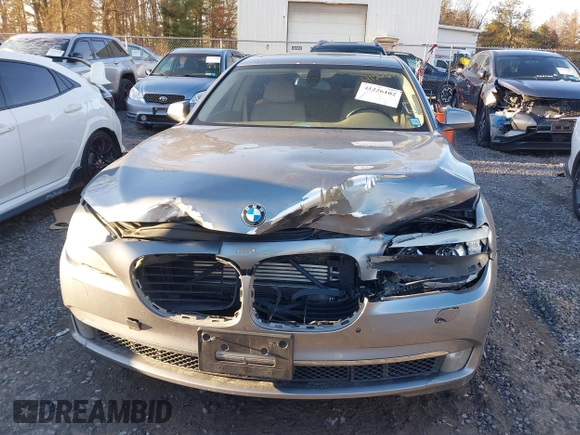2011 BMW 7 Series 750i xDrive with VIN WBAKC6C58BC394310, listed as a IAAI auction lot 41226102 with 183,907 mi miles and . Bid and sale history available at DreamBid. Image 6.