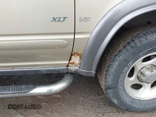 2000 Ford Explorer XLT z VIN 1FMZU83P1YZC35657, wystawiony jako IAAI lot #42278366 z przebiegiem Nie podano mil oraz . Historia ofert i sprzedaży dostępna na DreamBid. Obrazek 6.