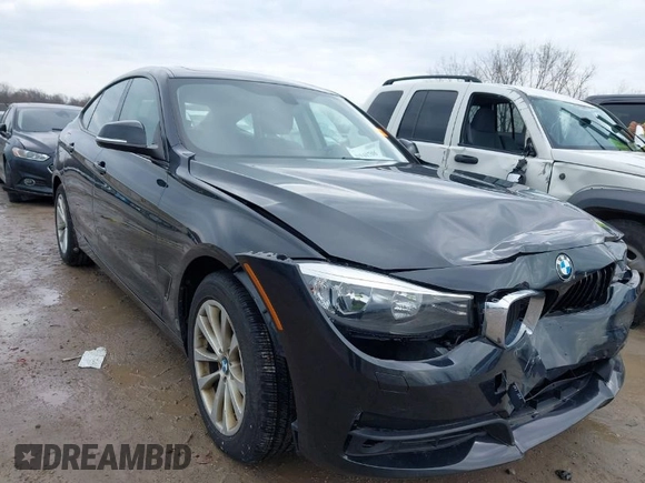 2014 BMW 3 Series 328i Gran Turismo xDrive z VIN WBA3X5C51ED558871, wystawiony jako IAAI lot #41940706 z przebiegiem 74 126 mil mil oraz . Historia ofert i sprzedaży dostępna na DreamBid. Obrazek 1.