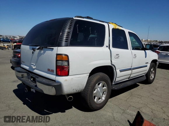 2004 GMC Yukon SLE with VIN 1GKEK13T54J168734, listed as a Copart auction lot 71235204 with 174,429 mi miles and Salvage Title. Bid and sale history available at carsss.com. Image 3.