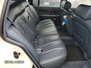 1994 Cadillac Fleetwood z VIN 1G6DW52PXRR717413, wystawiony jako Copart lot #84355464 z przebiegiem 143 507 mil mil oraz Tytuł czysty. Historia ofert i sprzedaży dostępna na DreamBid. Obrazek 10.