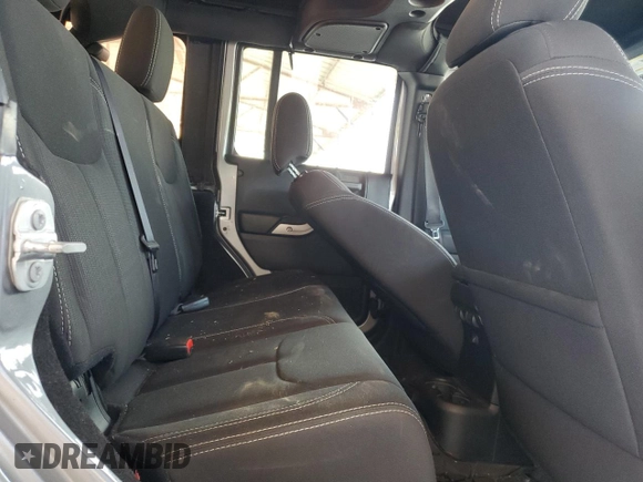 2017 Jeep Wrangler Unlimited Rubicon with VIN 1C4BJWFG4HL677477, listed as a Copart auction lot 57758175 with 89,584 mi miles and Salvage title. Bid and sale history available at DreamBid. Image 10.