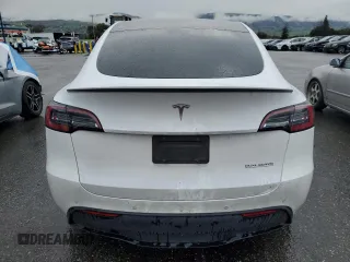2022 Tesla Model Y Performance with VIN 7SAYGDEF3NF390848, listed as a Copart auction lot 49441025 with 42,488 mi miles and Salvage Title. Bid and sale history available at DreamBid. Image 6.