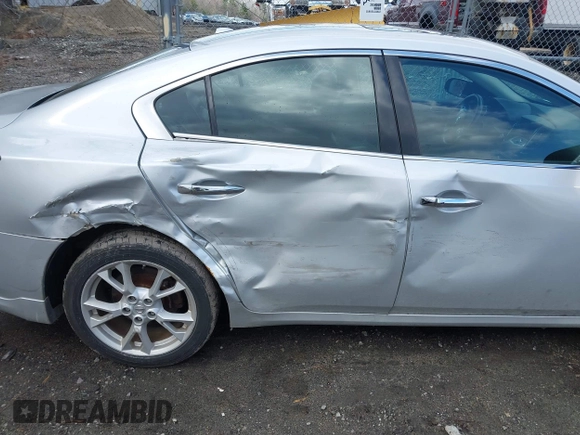 2013 Nissan Maxima S with VIN 1N4AA5AP0DC838596, listed as a IAAI auction lot 41992360 with 117,096 mi miles and . Bid and sale history available at DreamBid. Image 6.