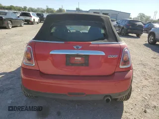 2009 MINI Convertible z VIN WMWMR335X9TU95073, wystawiony jako Copart lot #73690884 z przebiegiem 63 888 mil mil oraz Szkoda całkowita • Salvage title. Historia ofert i sprzedaży dostępna na DreamBid. Obrazek 6.
