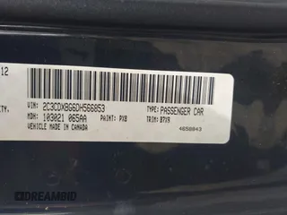 2013 Dodge Charger SE with VIN 2C3CDXBG6DH566853, listed as a IAAI auction lot 41924747 with 212,916 mi miles. Bid and sale history available at carsss.com. Image 9.