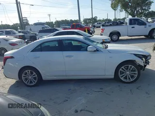 2024 Cadillac CT4 Luxury z VIN 1G6DA5RK2R0124982, wystawiony jako IAAI lot #42075299 z przebiegiem 21 660 mil mil oraz . Historia ofert i sprzedaży dostępna na DreamBid. Obrazek 13.