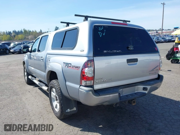 2014 Toyota Tacoma with VIN 3TMLU4EN7EM146705, listed as a IAAI auction lot 41949827 with 147,887 mi miles and . Bid and sale history available at DreamBid. Image 3.