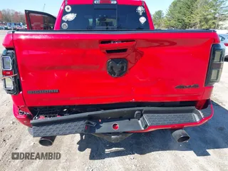 2021 Ram 1500 Big Horn with VIN 1C6SRFFT3MN677725, listed as a IAAI auction lot 41989636 with 37,784 mi miles and . Bid and sale history available at DreamBid. Image 4.