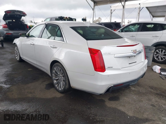 2018 Cadillac CTS Sedan Luxury AWD with VIN 1G6AX5SX2J0127618, listed as a IAAI auction lot 41785890 with 79,994 mi miles. Bid and sale history available at carsss.com. Image 3.