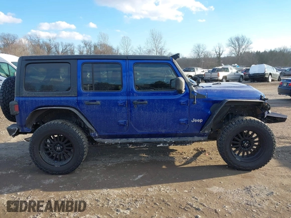 2020 Jeep Wrangler Unlimited Sport S z VIN 1C4HJXDN0LW347487, wystawiony jako IAAI lot #41449066 z przebiegiem 44 007 mil mil oraz . Historia ofert i sprzedaży dostępna na DreamBid. Obrazek 13.
