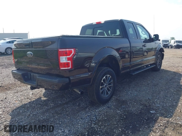 2018 Ford F-150 XL with VIN 1FTFX1E59JKG09710, listed as a IAAI auction lot 42458880 with 89,222 mi miles and . Bid and sale history available at DreamBid. Image 4.