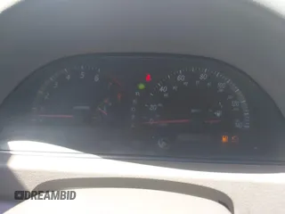 2002 Toyota Camry XLE z VIN 4T1BF32K42U007564, wystawiony jako IAAI lot #42534864 z przebiegiem 133 850 mil mil oraz . Historia ofert i sprzedaży dostępna na DreamBid. Obrazek 7.