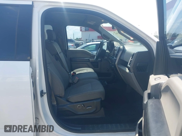 2015 Ford F-150 XLT with VIN 1FTEW1EFXFKD32631, listed as a IAAI auction lot 42454554 with 162,104 mi miles and . Bid and sale history available at DreamBid. Image 5.