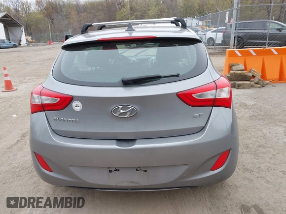 2014 Hyundai Elantra GT with VIN KMHD35LH6EU165019, listed as a IAAI auction lot 42016057 with 121,794 mi miles. Bid and sale history available at carsss.com. Image 16.