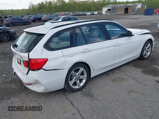 2014 BMW 3 Series 328i xDrive with VIN WBA3G7C55EKN37528, listed as a IAAI auction lot 42031076 with 55,627 mi miles and . Bid and sale history available at carsss.com. Image 4.