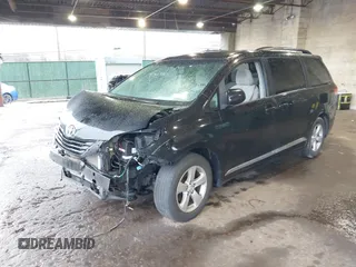 2014 Toyota Sienna LE AAS with VIN 5TDKK3DC7ES426751, listed as a IAAI auction lot 41975870 with 100,000 mi miles and . Bid and sale history available at carsss.com. Image 18.