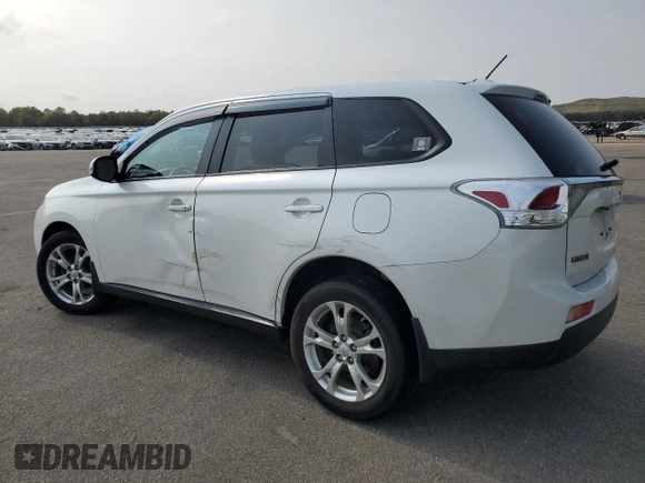 2014 Mitsubishi Outlander SE z VIN JA4AZ3A39EZ016327, wystawiony jako Copart lot #59977075 z przebiegiem 77 214 mil mil oraz Szkoda całkowita • Salvage title. Historia ofert i sprzedaży dostępna na DreamBid. Obrazek 2.