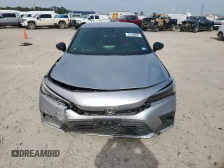 2023 Honda Civic Sport z VIN 2HGFE2F57PH509181, wystawiony jako Copart lot #57286025 z przebiegiem Nie podano mil oraz Szkoda całkowita • Salvage title. Historia ofert i sprzedaży dostępna na DreamBid. Obrazek 5.