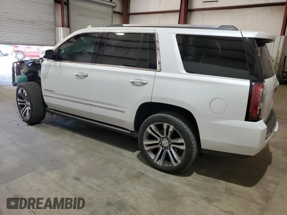 2020 GMC Yukon Denali with VIN 1GKS1CKJ3LR107335, listed as a Copart auction lot 49971315 with 139,967 mi miles and Salvage Title. Bid and sale history available at carsss.com. Image 2.