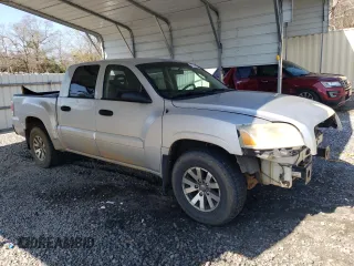 2007 Mitsubishi Raider LS z VIN 1Z7HC28K07S126258, wystawiony jako Copart lot #45863955 z przebiegiem 152 263 mil mil oraz Szkody całkowita. Historia ofert i sprzedaży dostępna na DreamBid. Obrazek 4.