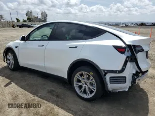 2024 Tesla Model Y z VIN 7SAYGDED4RF054565, wystawiony jako Copart lot #51188065 z przebiegiem 10 540 mil mil oraz Szkoda całkowita • Salvage title. Historia ofert i sprzedaży dostępna na DreamBid. Obrazek 2.