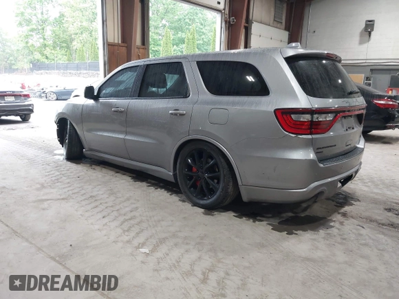 2017 Dodge Durango R/T with VIN 1C4SDJCT0HC799202, listed as a IAAI auction lot 42295142 with 83,103 mi miles and . Bid and sale history available at DreamBid. Image 3.