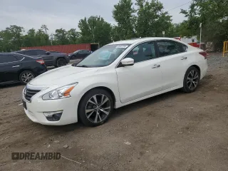 2013 Nissan Altima SL with VIN 1N4AL3AP5DC164704, listed as a Copart auction lot 58533795 with 153,377 mi miles and Salvage title. Bid and sale history available at DreamBid. Image 1.