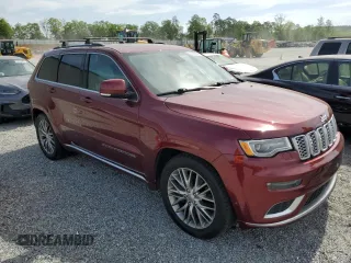 2017 Jeep Grand Cherokee Summit with VIN 1C4RJFJT8HC723895, listed as a Copart auction lot 53960565 with 115,252 mi miles and Salvage title. Bid and sale history available at DreamBid. Image 4.