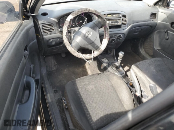 2010 Hyundai Accent GS z VIN KMHCM3AC7AU173953, wystawiony jako Copart lot #51433465 z przebiegiem 176 462 mil mil oraz Szkoda całkowita • Salvage title. Historia ofert i sprzedaży dostępna na DreamBid. Obrazek 8.
