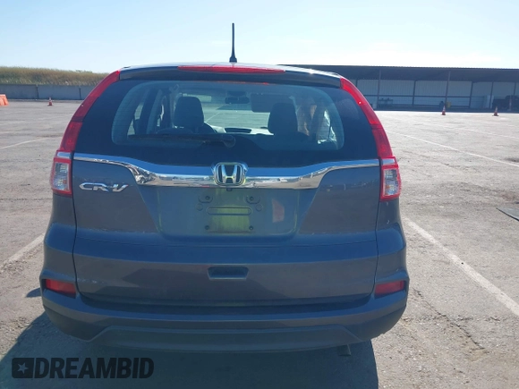 2015 Honda CR-V LX with VIN 3CZRM3H31FG709059, listed as a IAAI auction lot 42131551 with 98,738 mi miles and . Bid and sale history available at carsss.com. Image 16.