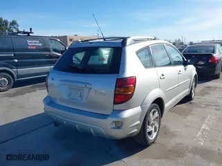 2004 Pontiac Vibe with VIN 5Y2SL62894Z402056, listed as a IAAI auction lot 41248001 with 241,231 mi miles. Bid and sale history available at carsss.com. Image 4.