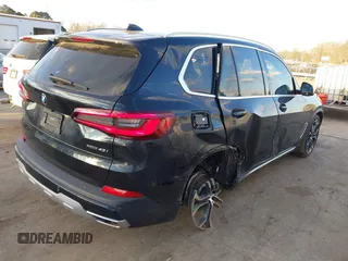 2021 BMW X5 xDrive40i with VIN 5UXCR6C08M9D76272, listed as a IAAI auction lot 41219782 with 56,599 mi miles and . Bid and sale history available at DreamBid. Image 6.